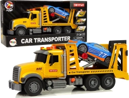 žlutý odtahový vůz s rampou se světly a zvuky