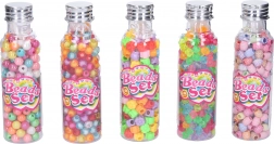 Barevné korálky v lahvičce