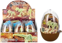 Zářící kostra dinosaura v plastovém vajíčku – sběratelský stavební set