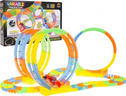 Fluorescenční závodní dráha pro děti 3+ s LED autíčkem, 3 smyčky a 148 dílů