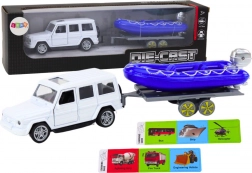 Terénní auto s přívěsem a motorovým člunem