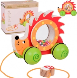 Dřevěný tahací ježek s barevnými kuličkami