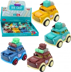 Kovové retro cestovní autíčko s pružinovým pohonem a poskakující kapotou