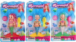 Mořská víla s dlouhými vlasy a lesklými šaty