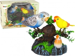 Zpívající pohyblivé papoušci na barevném stromku