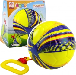 Žlutý pěnový míček na provázku se smršťovačem 14 cm