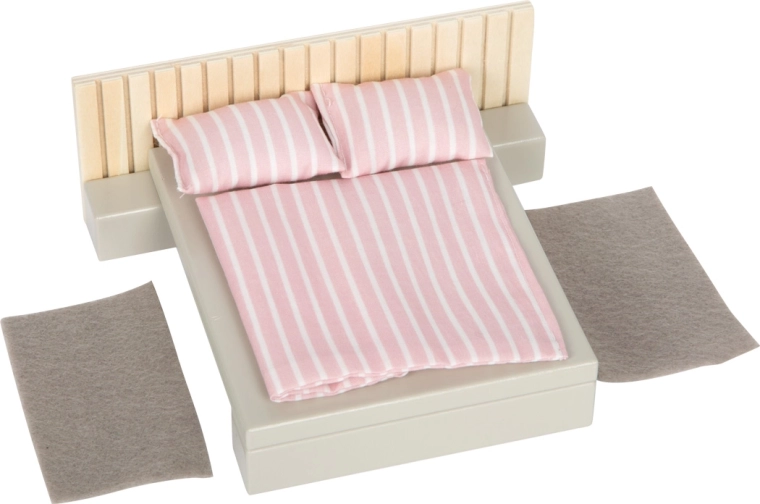 Útulná ložnice s textilním povlečením