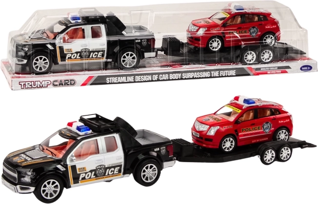 Policejní pickup s odtahovým přívěsem a terénním autem