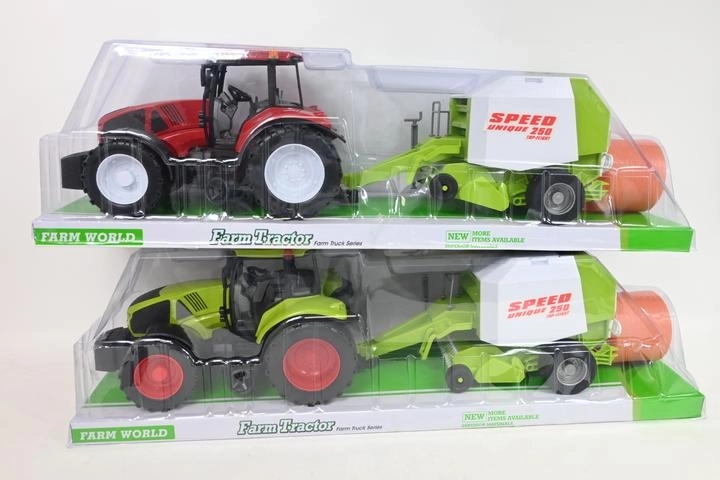 Velký traktor s lisem na balíky