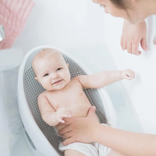 Ergonomická opora pro koupání od narození