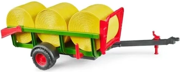 Přeprava tří kulatých balíků