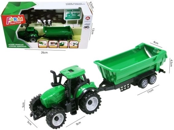 Zelený traktor s přívěsem a příslušenstvím