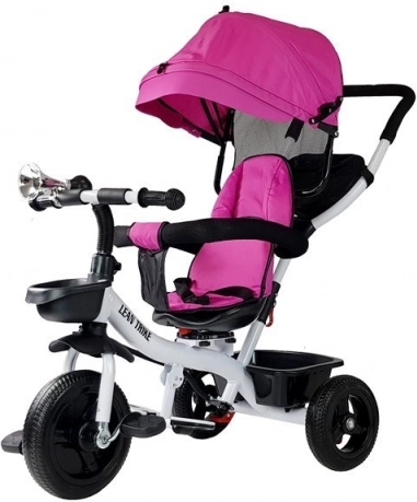 Dětská tříkolka s růžovým přehozem