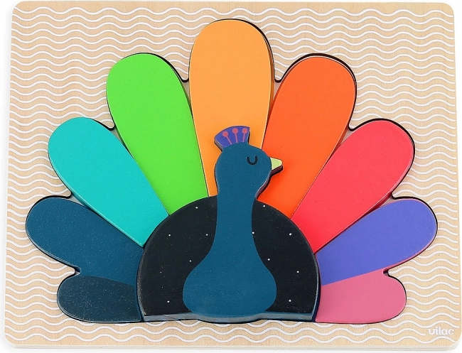 Dřevěné vkládací puzzle Páv od Vilac