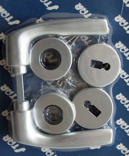 Dveřní rozetové kování MONET, klíč, stříbrný elox