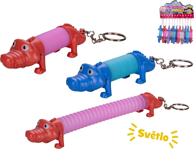 Natahovací přívěsek na klíče krokodýl se světlem