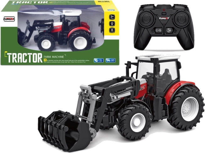 Červený dálkově ovládaný traktor 2,4 GHz s pohyblivou lopatou 1:24