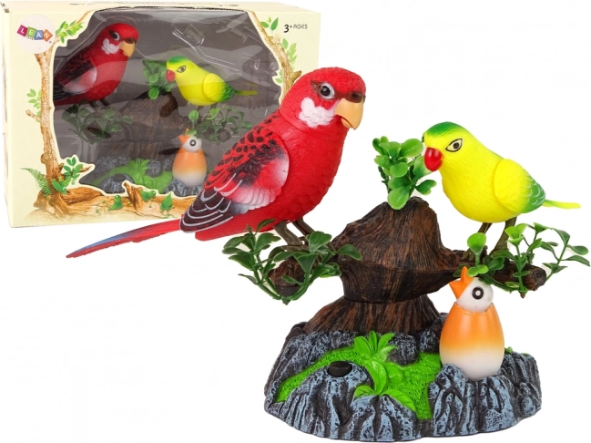 Zpívající pohyblivé papoušky na barevném stromě
