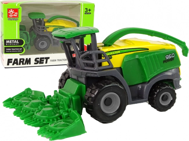 Zelený malý zemědělský kombajn – hračka