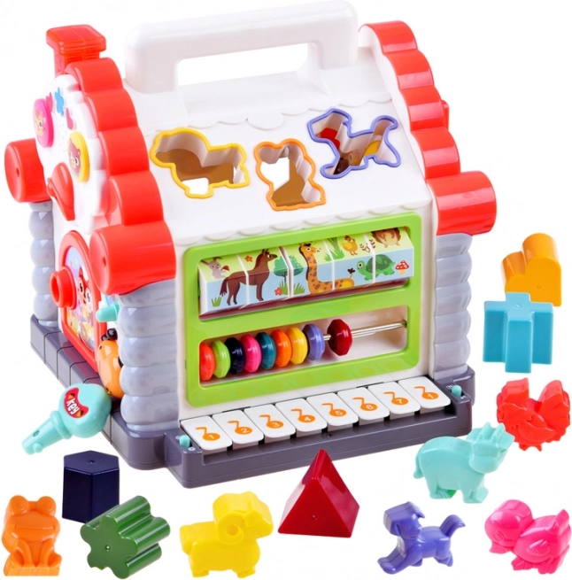 Interaktivní domeček – hudební třídička tvarů a zvířátek pro děti 18+ měsíců