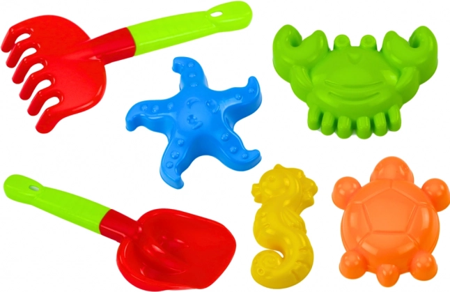 Sada hraček na písek s lopatkou, hráběmi a formičkami