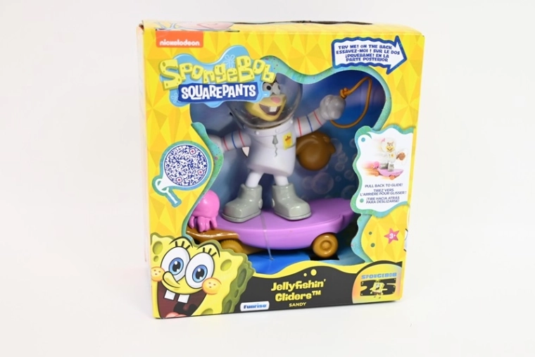 SpongeBob SquarePants figurka Sandy na skateboardu Jellyfishin’ Gliders