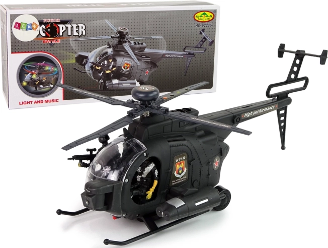 Vojenský vrtulník s křídly a světelnými efekty na baterie