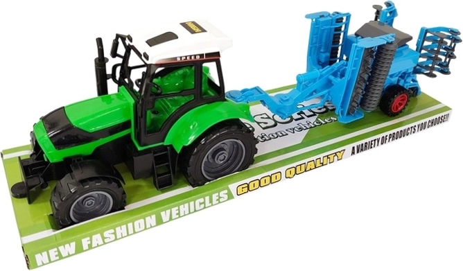 Dětský traktor s přídavným zemědělským strojem