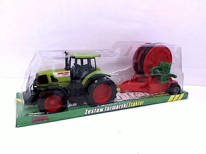 Traktor se zemědělským strojem