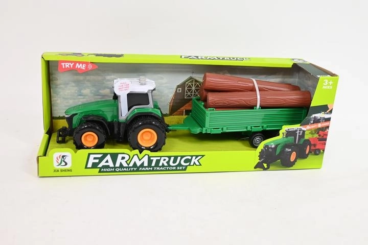 Traktor s přívěsem a kládami