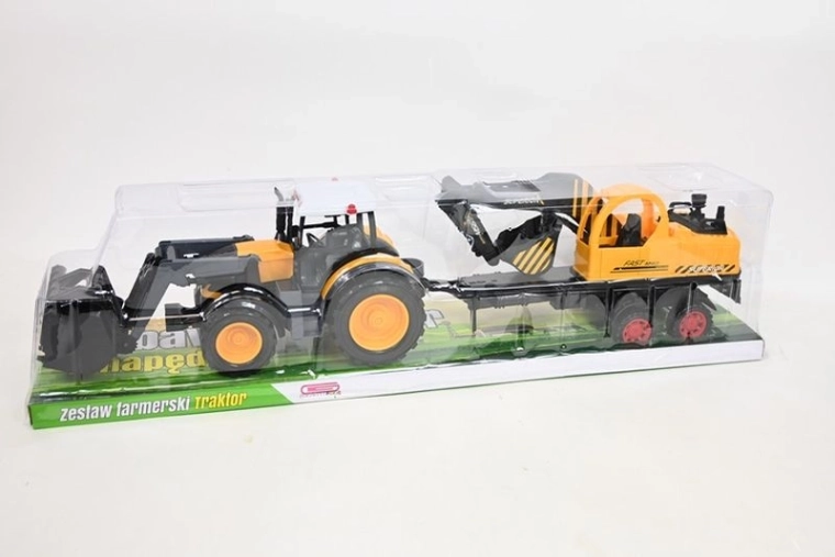 Traktor se stavebním strojem