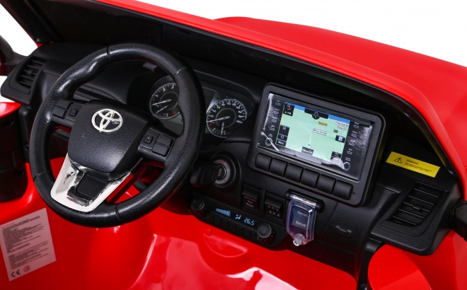 Toyota Hilux baterie pro děti Červená + pohon 4x4 + dálkové ovládání + 2 nosiče zavazadel + rádio MP3 + LED dioda
