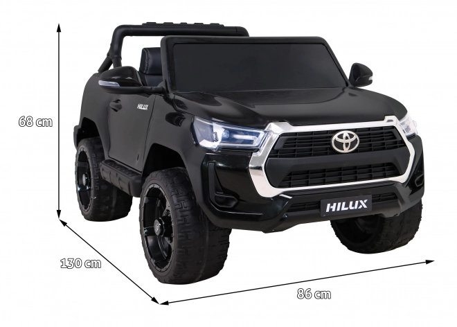 Toyota Hilux baterie pro děti černá + pohon 4x4 + dálkové ovládání + 2 nosiče zavazadel + rádio MP3 + LED dioda