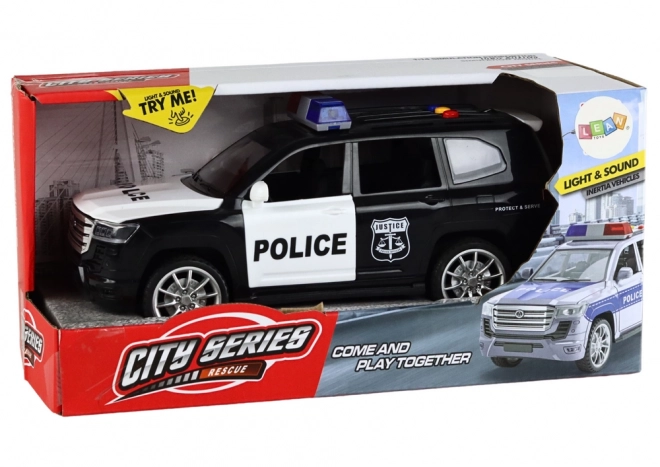 Policejní auto s efekty, otevíracími dveřmi a měřítkem 1:14