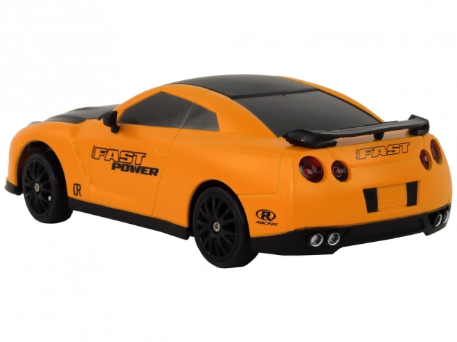 Dálkově ovládané sportovní auto R/C 1:24 vyměnitelná kola – žluté