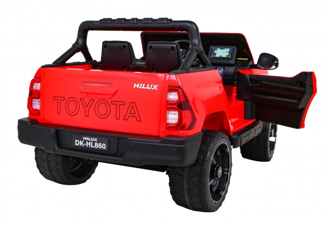 Toyota Hilux baterie pro děti Červená + pohon 4x4 + dálkové ovládání + 2 nosiče zavazadel + rádio MP3 + LED dioda