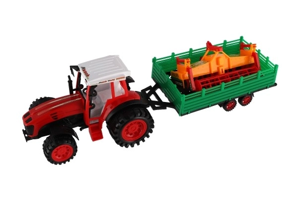 Traktor s vlekem s kombajnovým válcem plast 46cm na setrvačník  2 barvy v blistru