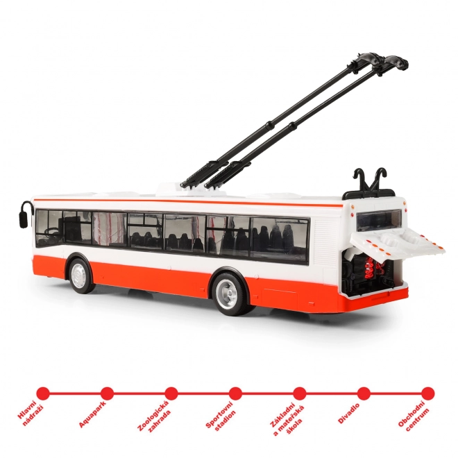 Trolejbus česky mluvící plast 29cm červený volný chod na bat. se světem se zvukem v krab. 33x11x10cm