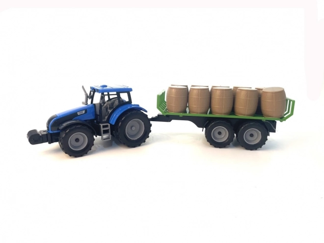 Traktor se setrvačníkem a přívěsem plným sena
