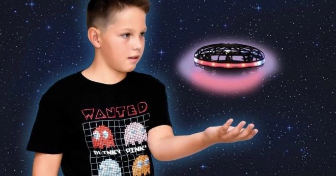 Svítící levitující ufo