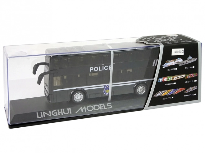 Policejní dvoupatrový černý autobus s třecím pohonem