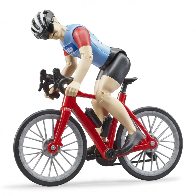 Silniční kolo s figurkou cyklisty