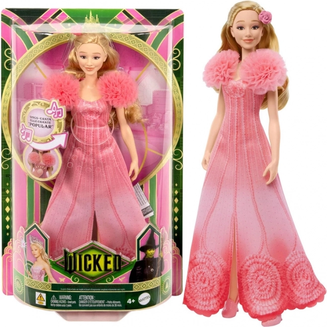 Zpívající panenka Glinda z filmu Wicked s písní "Popular"