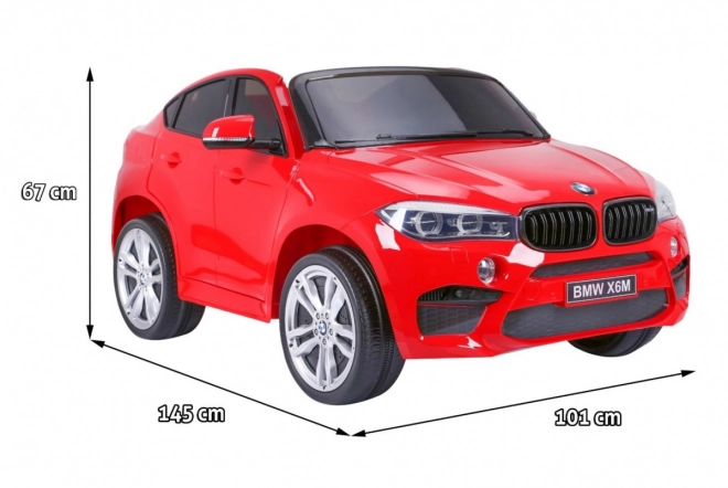 BMW X6M XXL pro 2 děti Červená + dálkové ovládání + eko kůže + bezpečnostní pásy + pomalý rozjezd + MP3 USB + LED dioda
