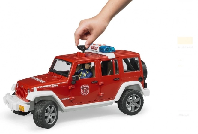 Červený požární Jeep Wrangler s figurkou a příslušenstvím