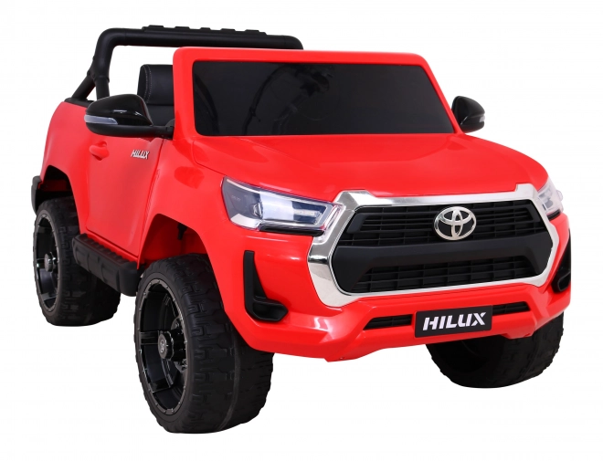 Toyota Hilux baterie pro děti Červená + pohon 4x4 + dálkové ovládání + 2 nosiče zavazadel + rádio MP3 + LED dioda