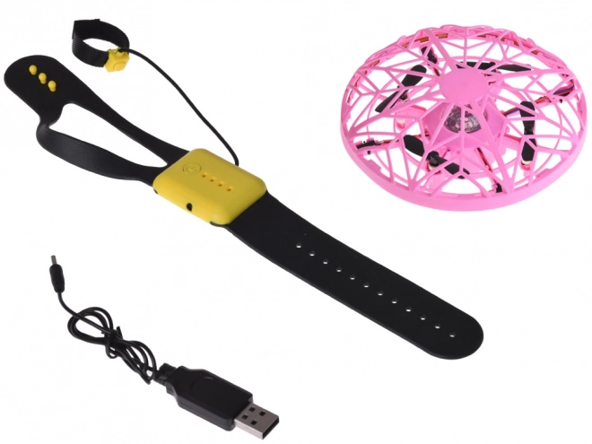 Létající disk s LED světlem ovládaný rukou