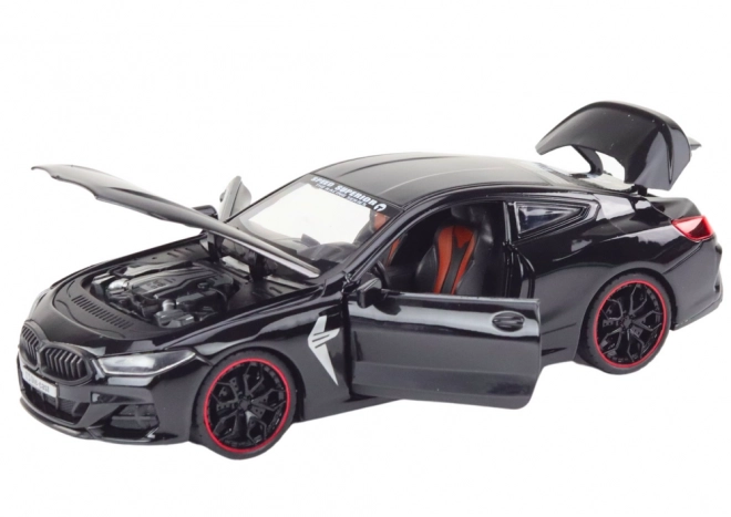 Kovové sportovní auto s třecím pohonem a otevíracími prvky 1:24 černé