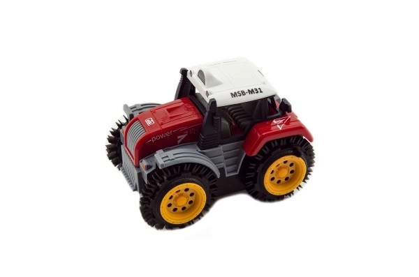 Traktor převracecí plast 10cm mix barev na baterie