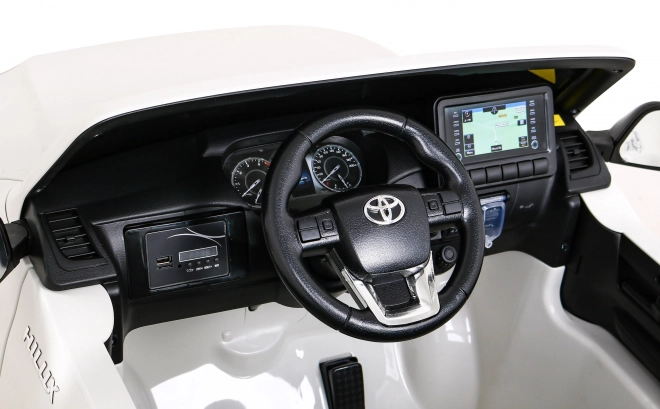 Toyota Hilux baterie pro děti Bílá + pohon 4x4 + dálkové ovládání + 2 nosiče zavazadel + rádio MP3 + LED dioda